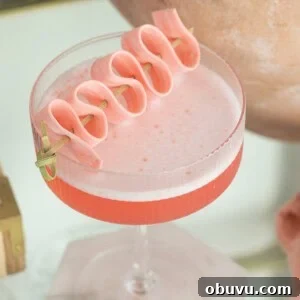 Bubble Gum Cocktail Recipe Using Infused Vodka 9 Bubble gum cocktail recipe with pink bubble gum garnish.