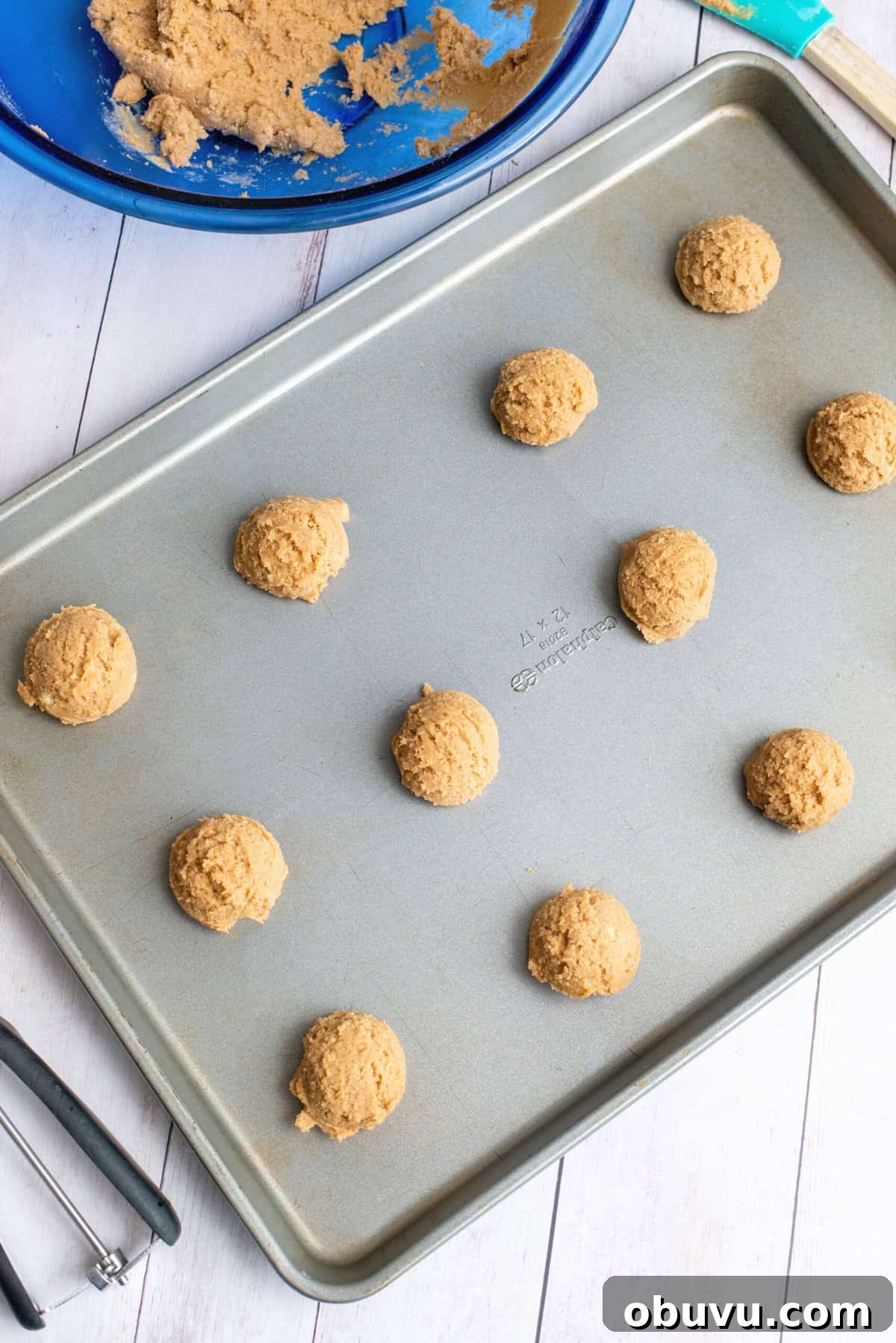 Cookie Butter Sandwich Cookies — Crunchy Fillings & Simple Recipe 8 scoop cookies onto cookie sheet