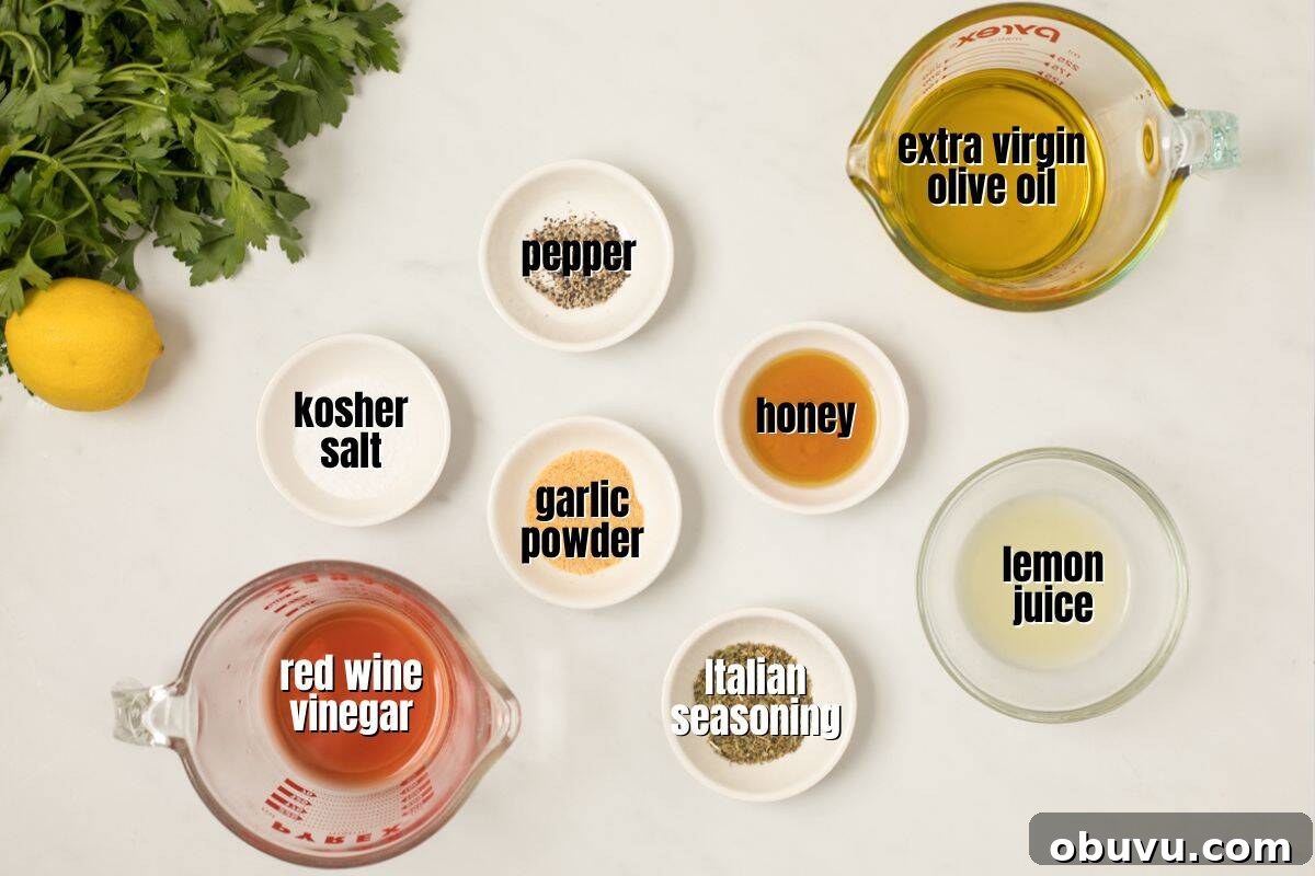 Ingredients for Italian salad dressing labeled on counter.