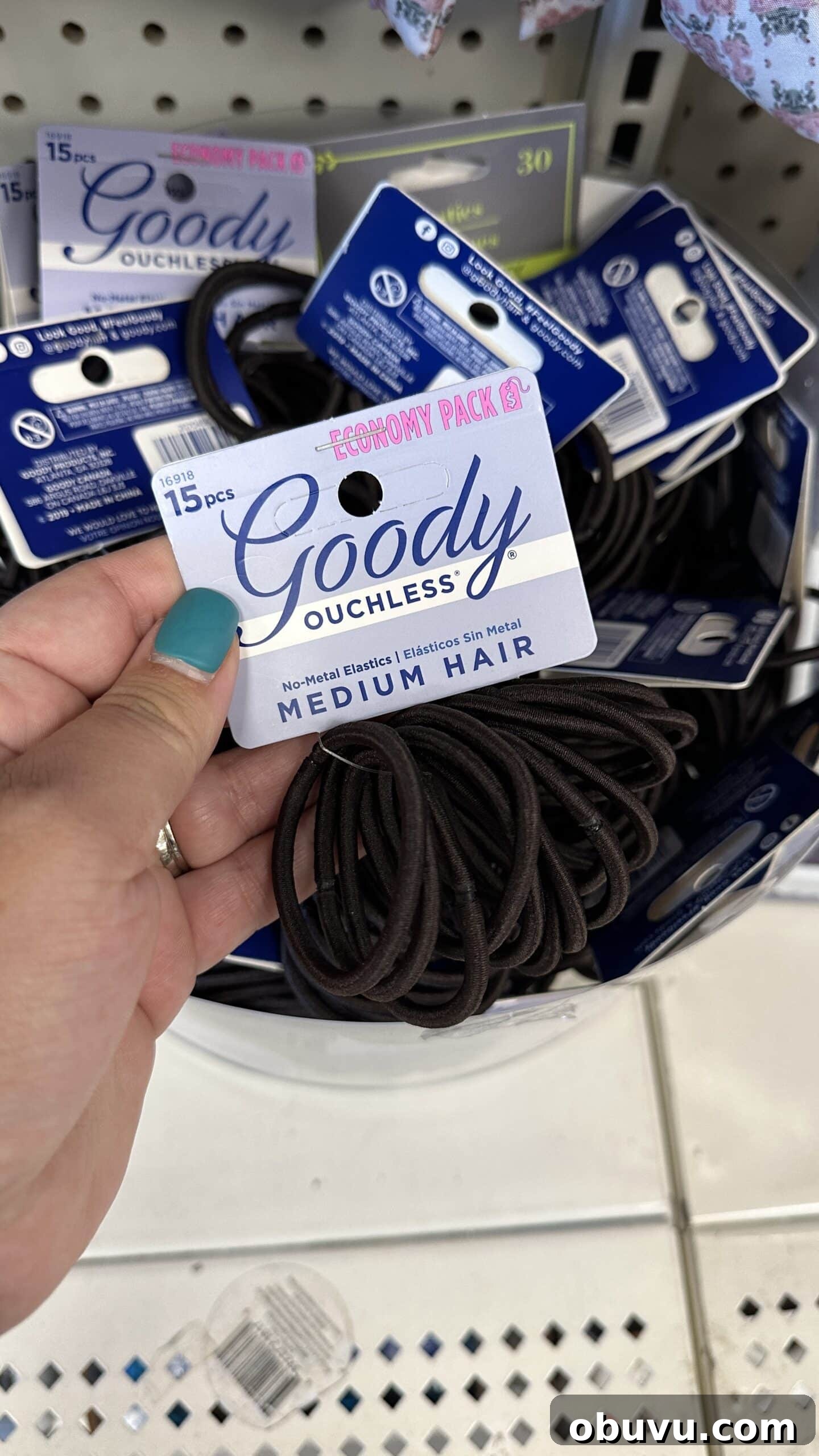 5 Dollar Tree Finds That Are Much Pricier at Walmart 7 hand holding hair ties at dollar tree