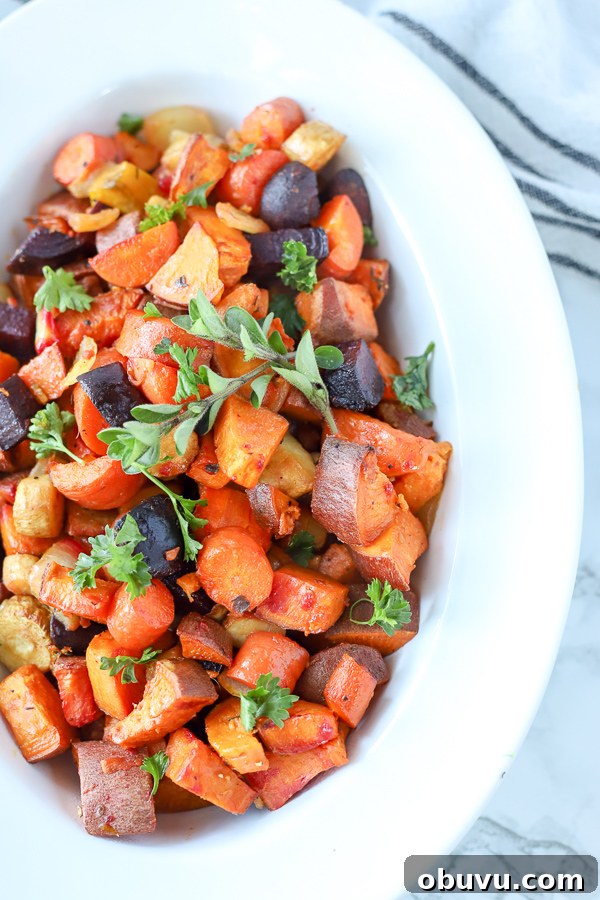 Crispy Roasted Root Vegetables with Herbed Garlic Glaze 4 roasted root vegetable recipe in a white bowl