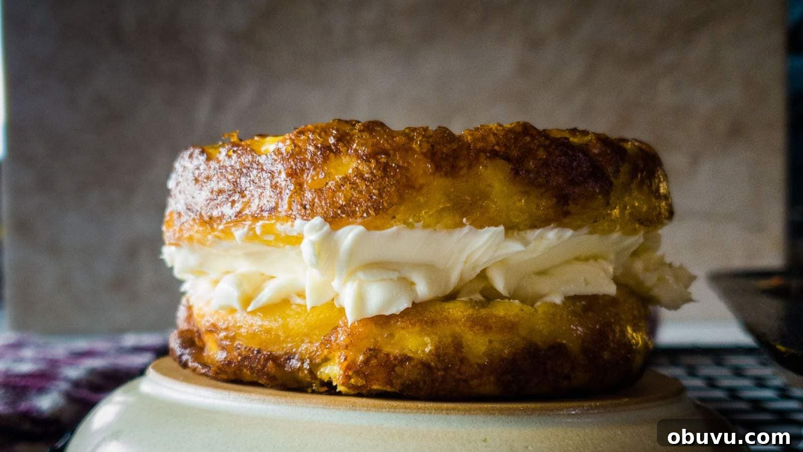 19 Cozy Low-Carb Breakfasts You’ll Crave Every Morning 2 A picture of a two Ingredient English Muffins with cream cheese.