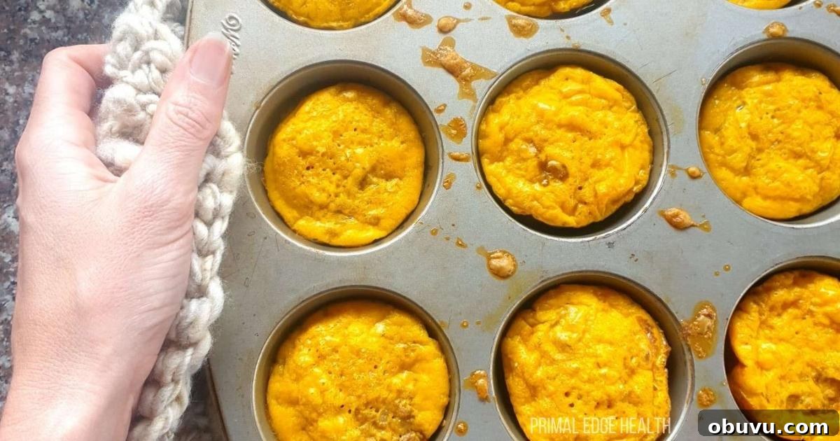 19 Cozy Low-Carb Breakfasts You’ll Crave Every Morning 14 Easy Keto Egg Muffins on cooling rack.