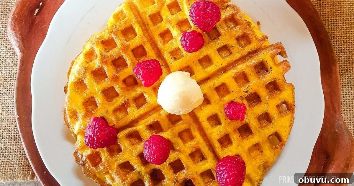 19 Cozy Low-Carb Breakfasts You’ll Crave Every Morning 8 2-Ingredient Flourless Waffles with raspberries.