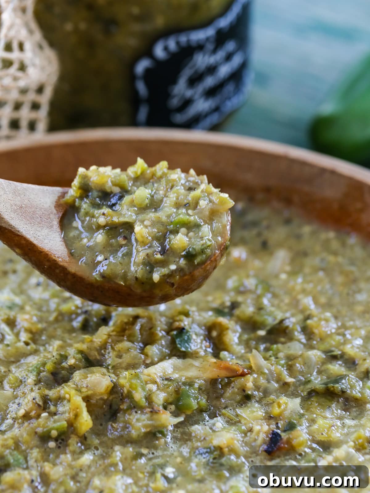 Homemade Salsa Verde Enchilada Sauce Recipe 15 Wooden spoon with green enchilada sauce