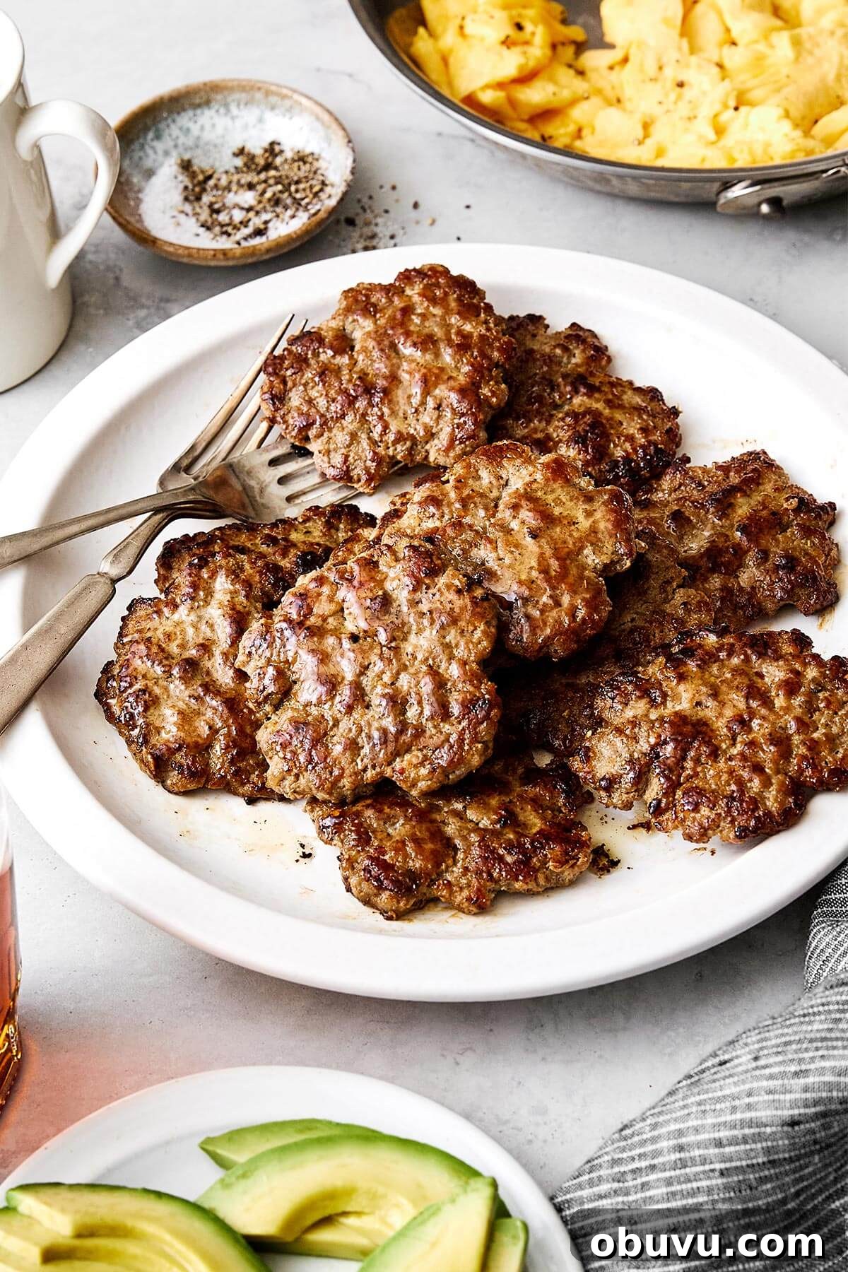 20 High-Protein Breakfast Recipes for Lasting Energy 20 A plate of breakfast sausages.