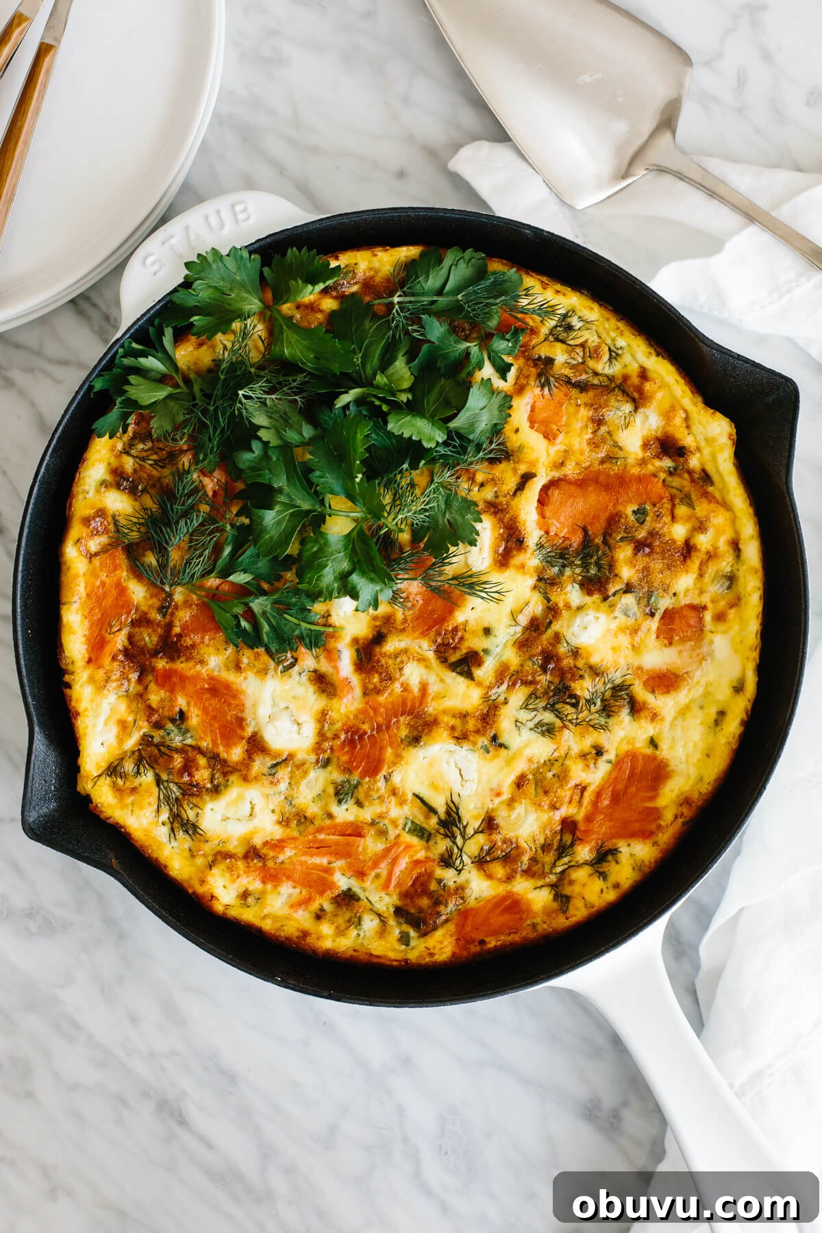 20 High-Protein Breakfast Recipes for Lasting Energy 7 Smoked salmon frittata recipe in a pan.