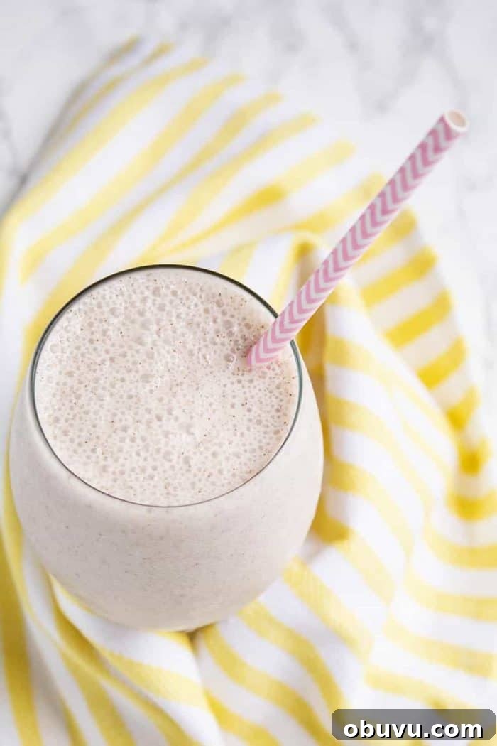 Keto Iced Coffee with 4 Ingredients: Creamy Low-Carb Recipe 9 keto breakfast without eggs on a yellow and white towel with a pink straw sticking out