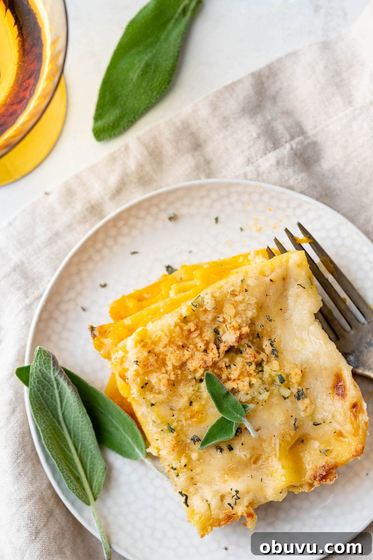 Creamy Butternut Squash Lasagna with Sage and Ricotta 11 an overhead shot of a serving of lasagna on a plate.
