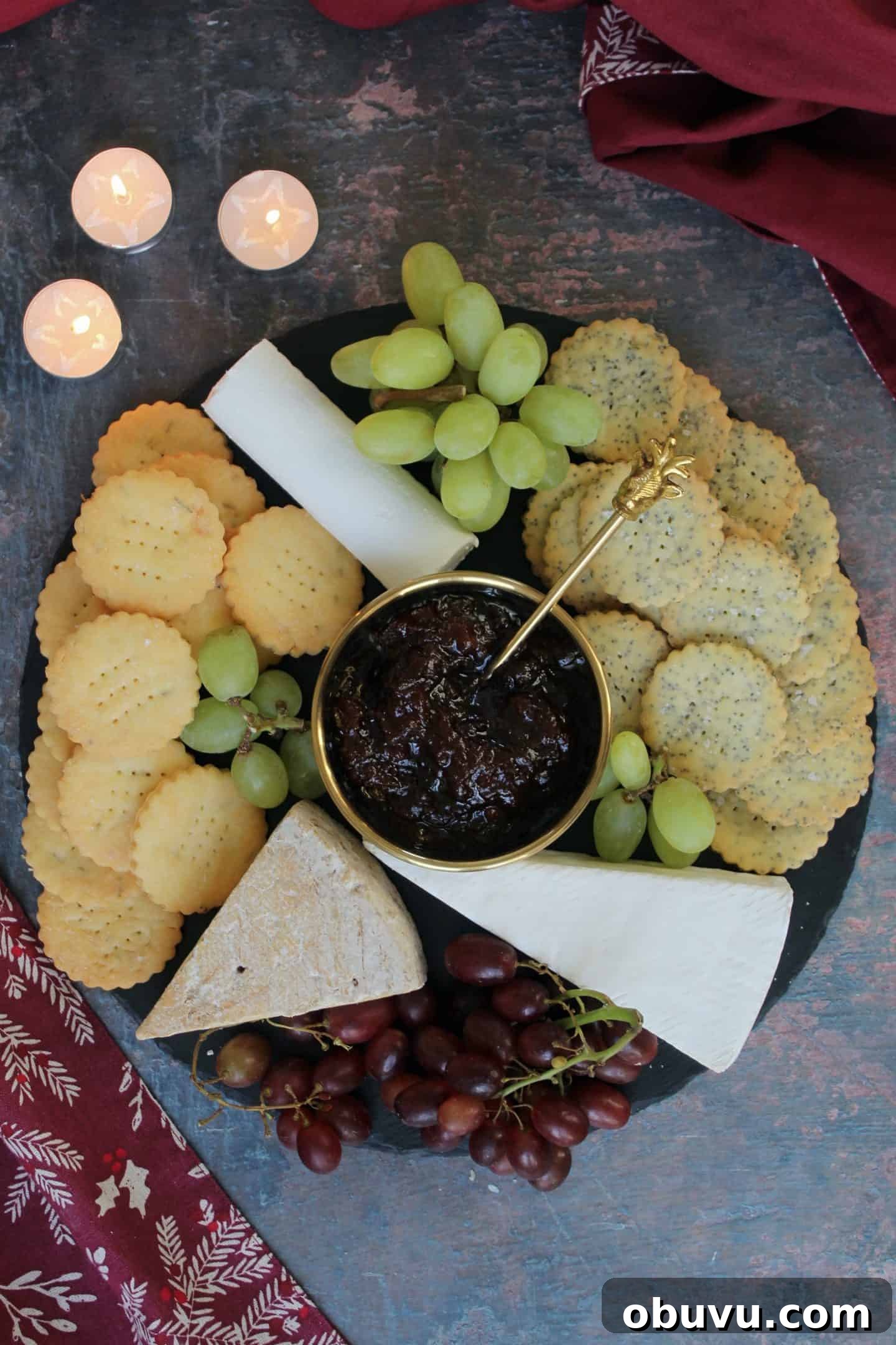 A cheeseboard filled with gluten free crackers.