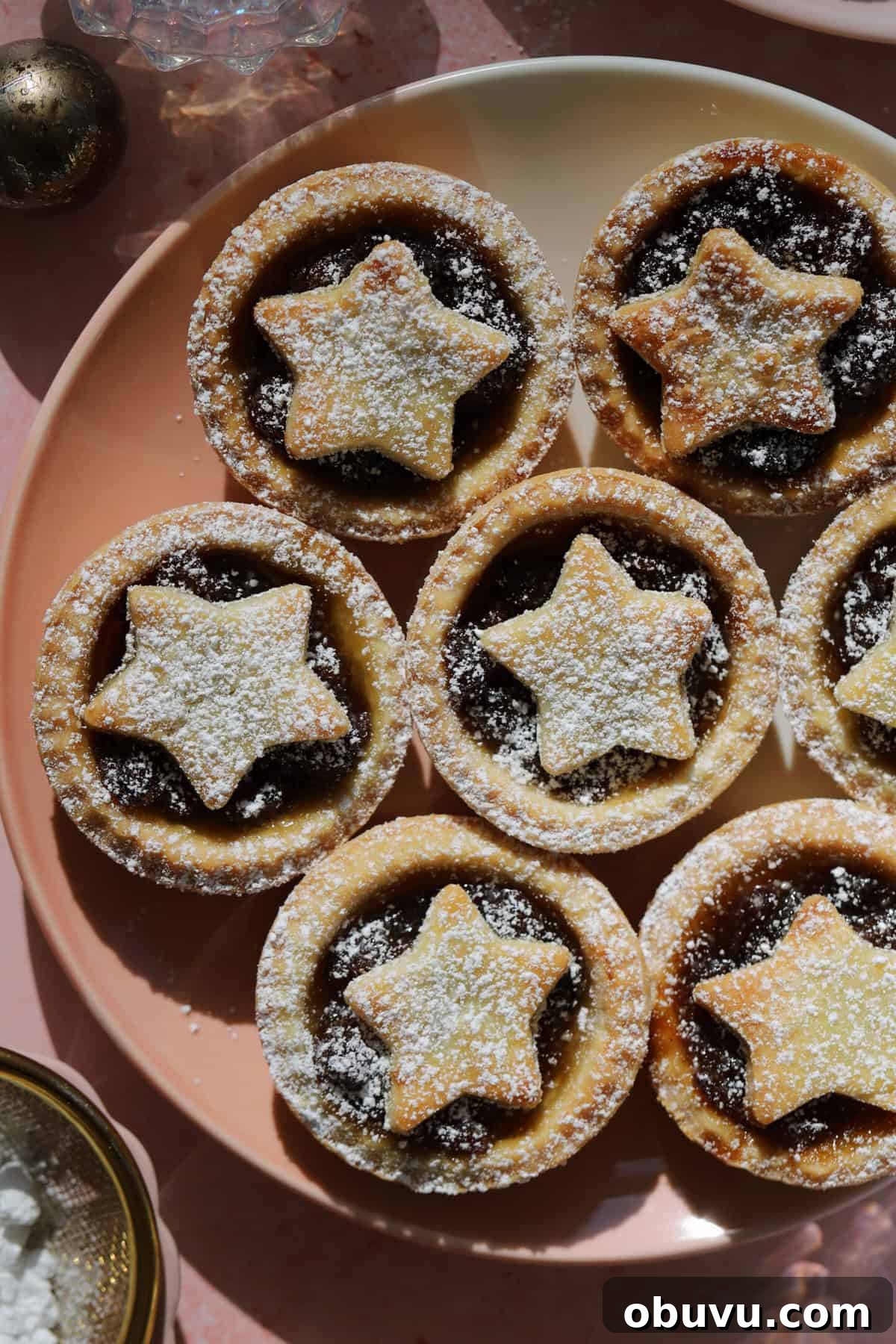 A plate of gluten free mince pies with star tops.
