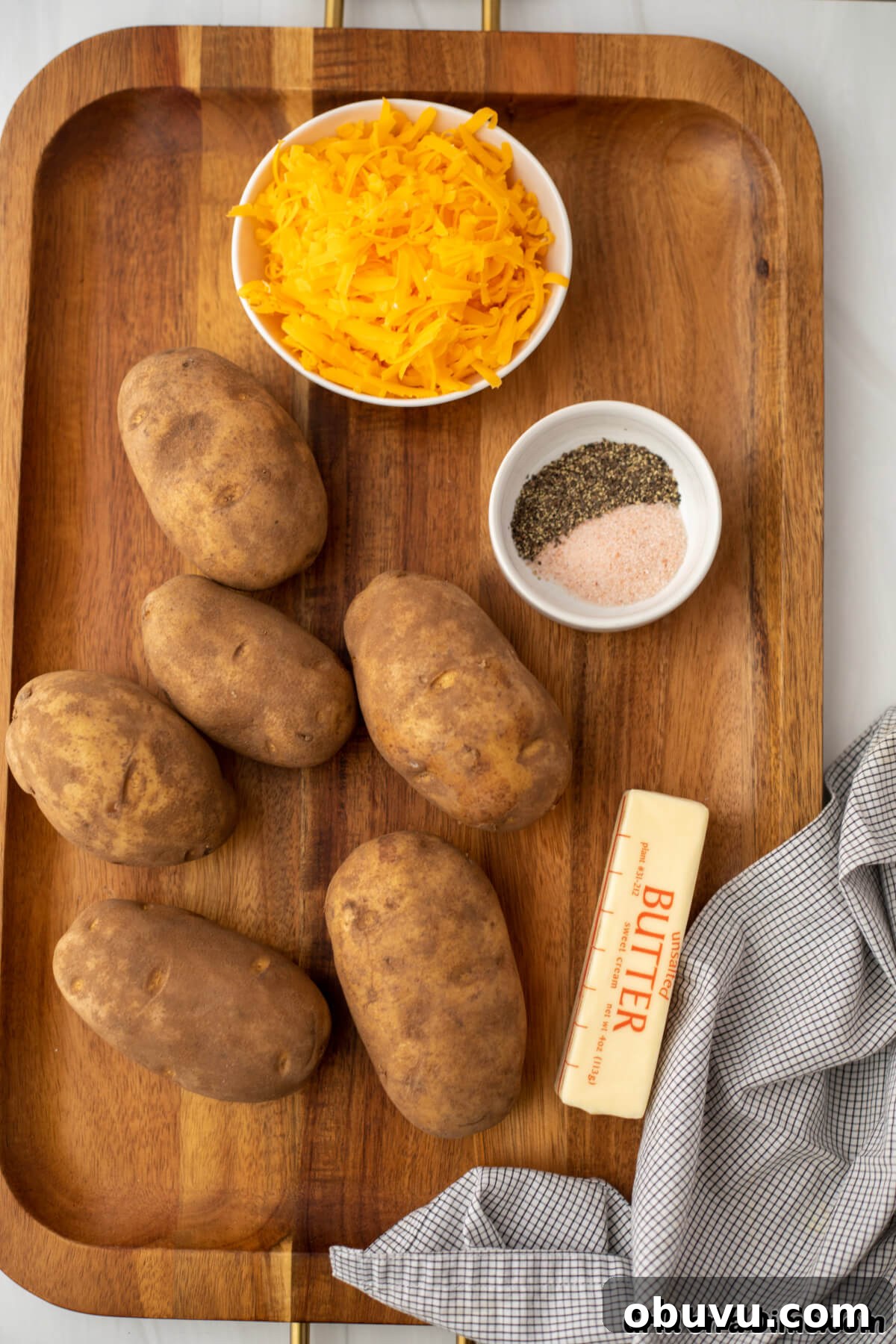 Ingredients needed - potatoes, onion, butter, salt and pepper, cheese