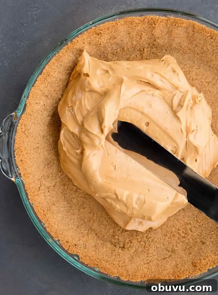 Easy Banoffee Cream Pie pairs the short cut of dulce de leche with the twist of adding cream cheese. A drizzle of Nutella syrup takes it over the top!