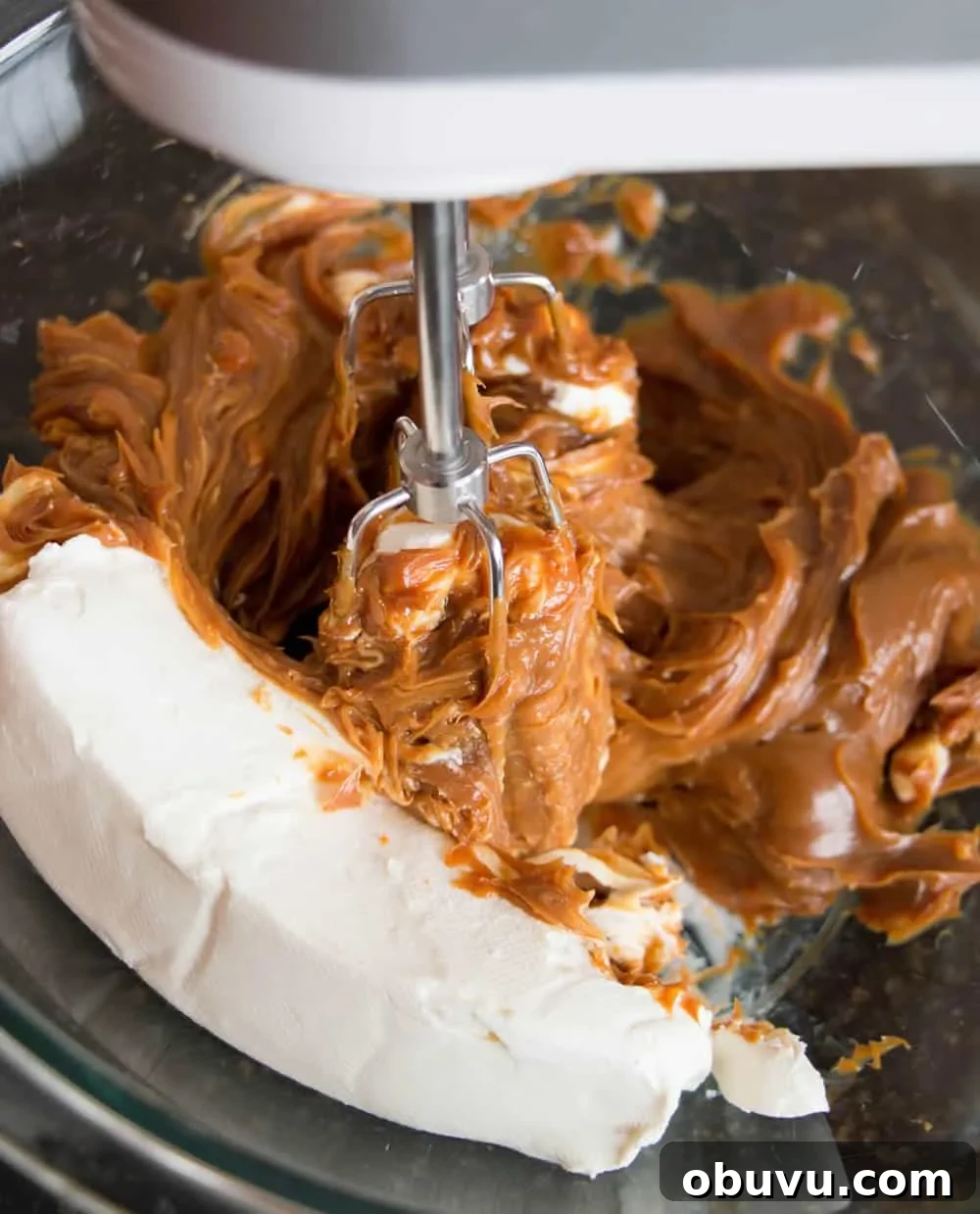Easy Banoffee Cream Pie pairs the short cut of dulce de leche with the twist of adding cream cheese. A drizzle of Nutella syrup takes it over the top!